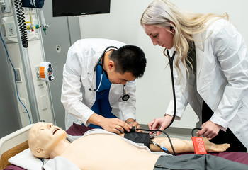 Nursing students at Saint Joseph's University practicing in a hospital setting
