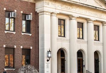 Closeup of the Philadelphia College of Pharmacy building in winter