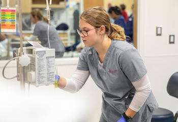 Female Saint Joseph's University nursing student in clinical center