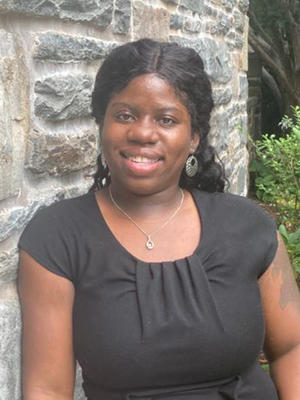 Natasha Jeanty wearing a black shirt