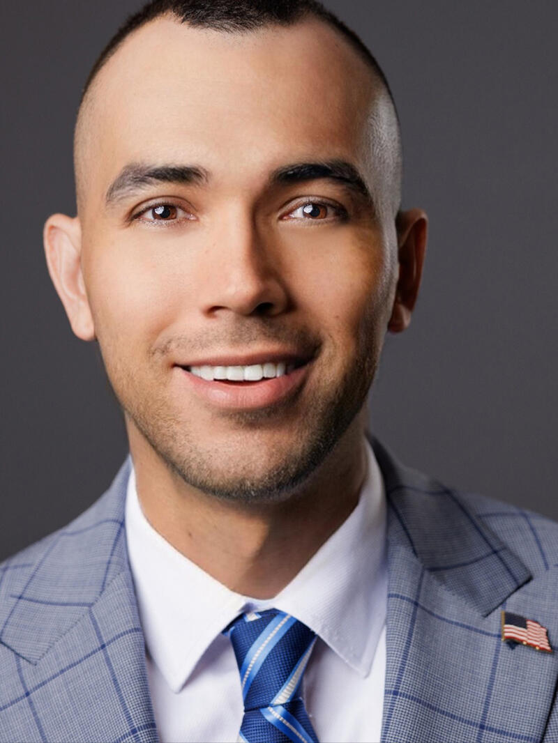 Man wearing gray suit