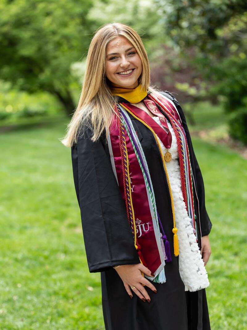 McNulty Scholar_Nora Zakrzewski_Class of 2026_in graduation cap and gown_2000x3000