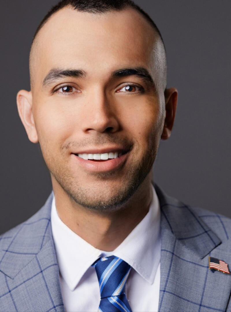 Man wearing gray suit