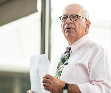 saint joseph's university's department of physics faculty Paul Angiolillo speaking