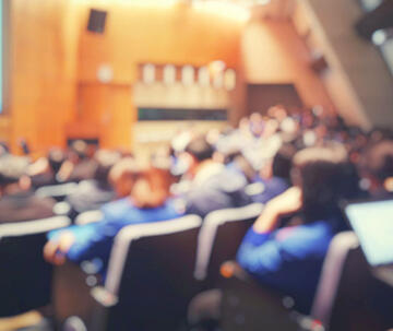 Group of participants in a conference room at the Food Industry Summit at Saint Joseph's University