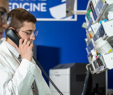 PCP Pharmacy student talking on the phone 
