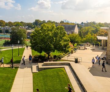 Saint Josephs university library with students walking outdoors
