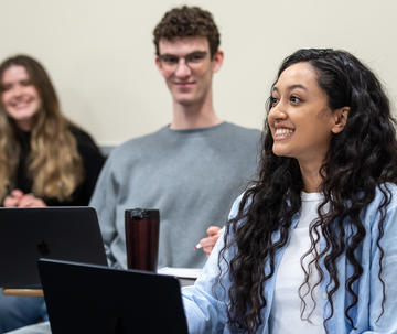 Four students in SJU classroom in Barbelin Hall