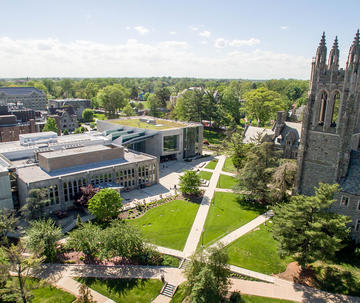 Aerial view of Saint Joseph's University campus with Philadelphia skyline in the background