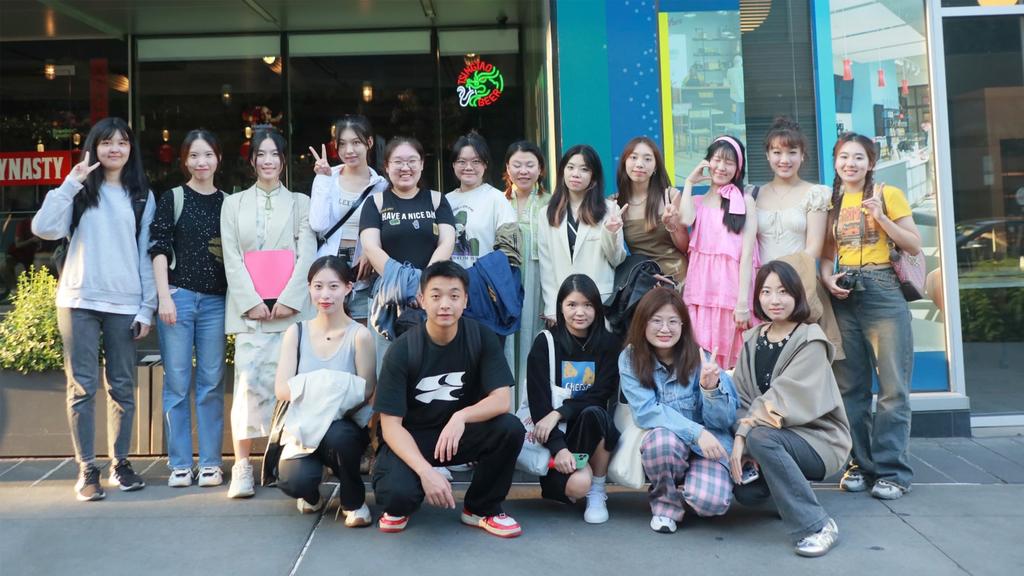 HNNU students in front of Han Dynasty restaurant
