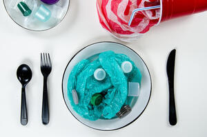 wrung out plastic bottles served on a plate