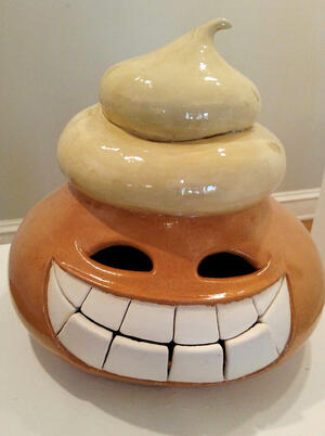 smiling ceramic creature