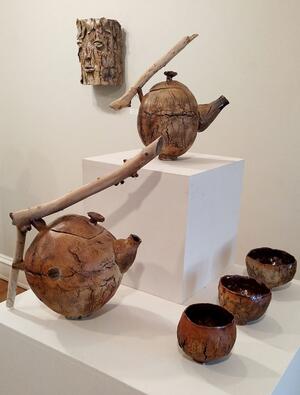 ceramic jugs with spouts and cups