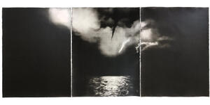 black and white photo tryptich of missiles at night