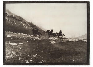 black and white photo of three men on horseback