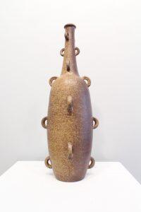 vase with long spout and multiple handles