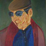 portrait of man with hat and glasses