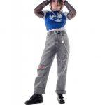 photograph of someone wearing a t-shirt with a blue pattern on it