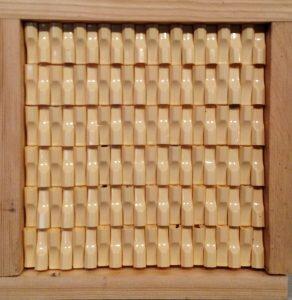 geometric sculpture made of cigarette filters