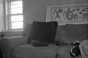 B+W photograph of pillow on sofa