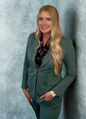 Calyn-Brewer-headshot-winter-2026-800x1100-png