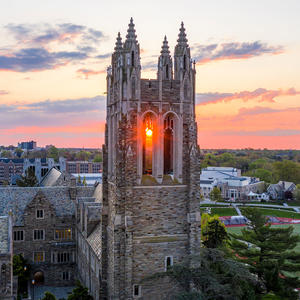 barbelin hall at saint joseph's university with the sun setting behind it