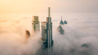 Top of skyscrapers above the clouds.